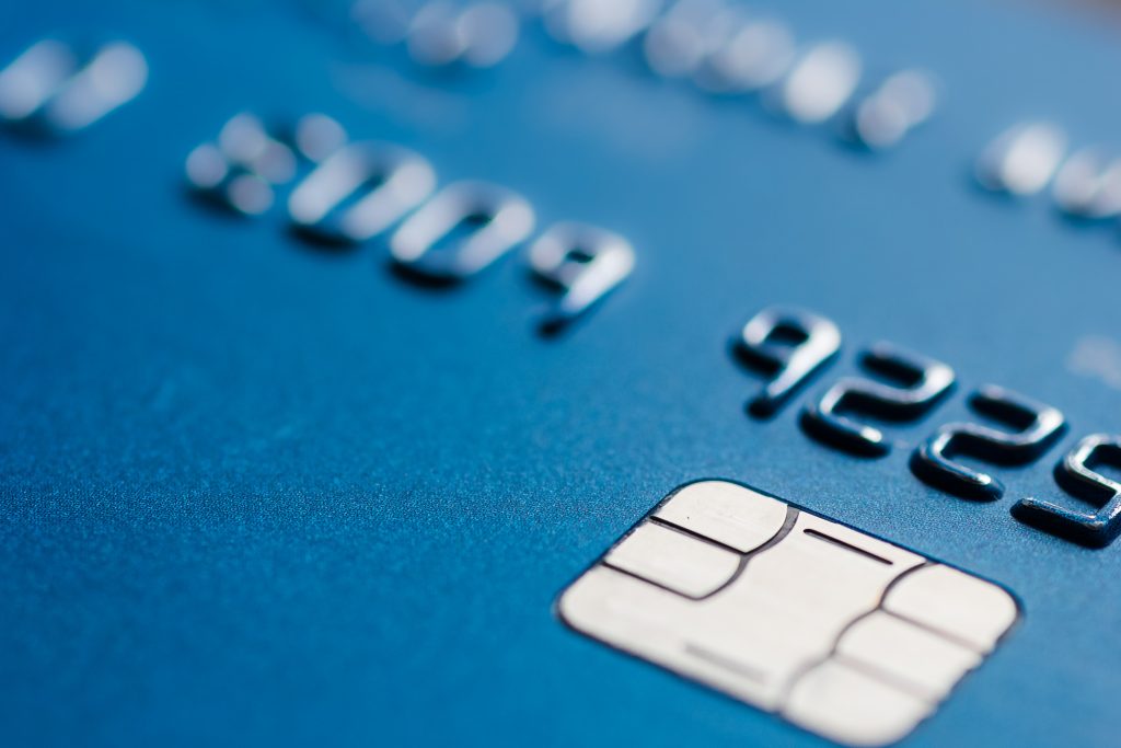 Blue credit card chip blurred atm emv