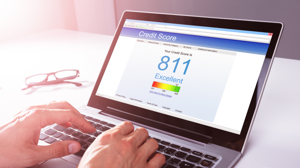 Businessman Checking Credit Score On Laptop