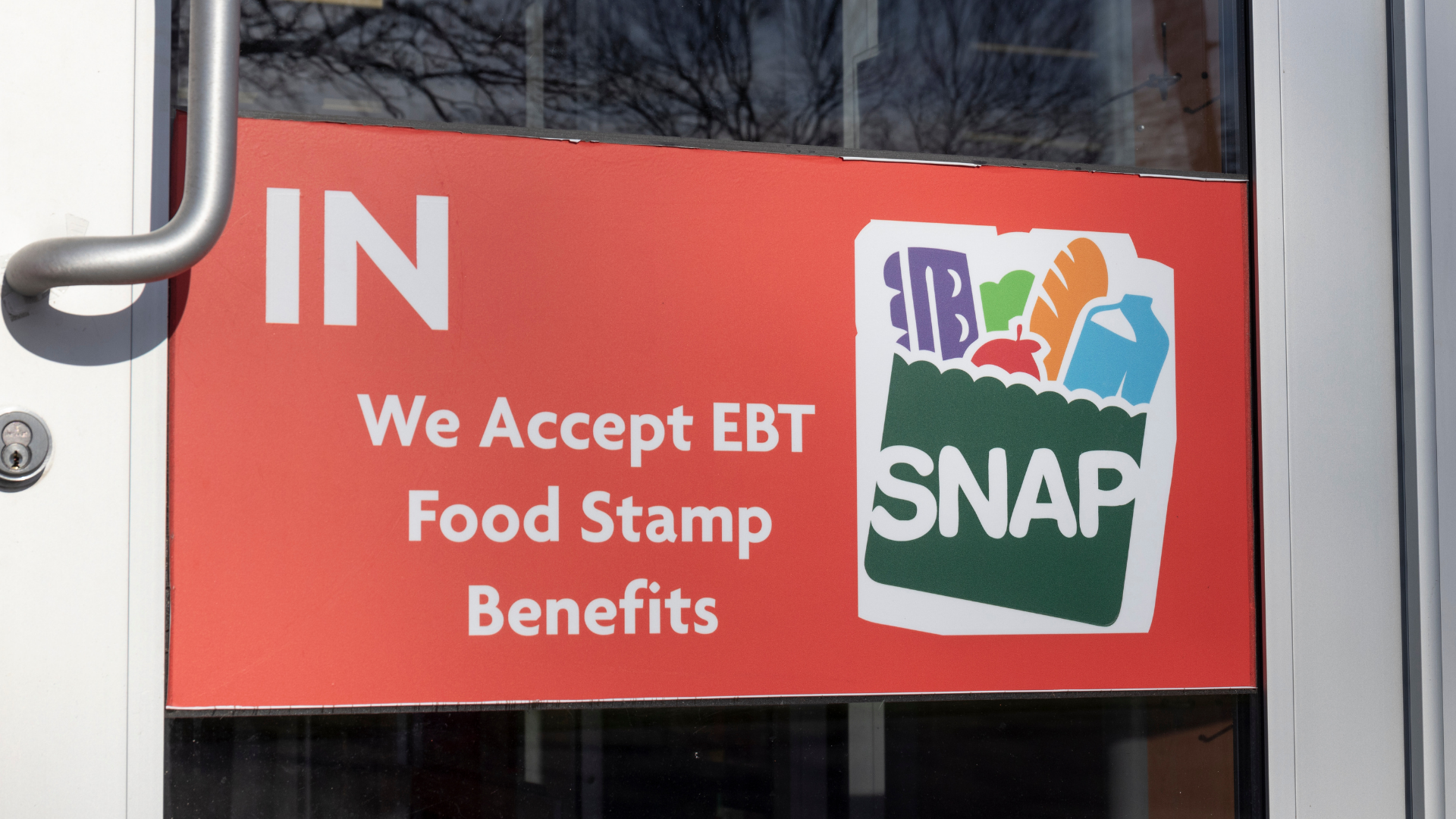 SNAP and EBT Accepted here sign. SNAP and Food Stamps provide nutrition benefits to supplement the budgets of disadvantaged families.