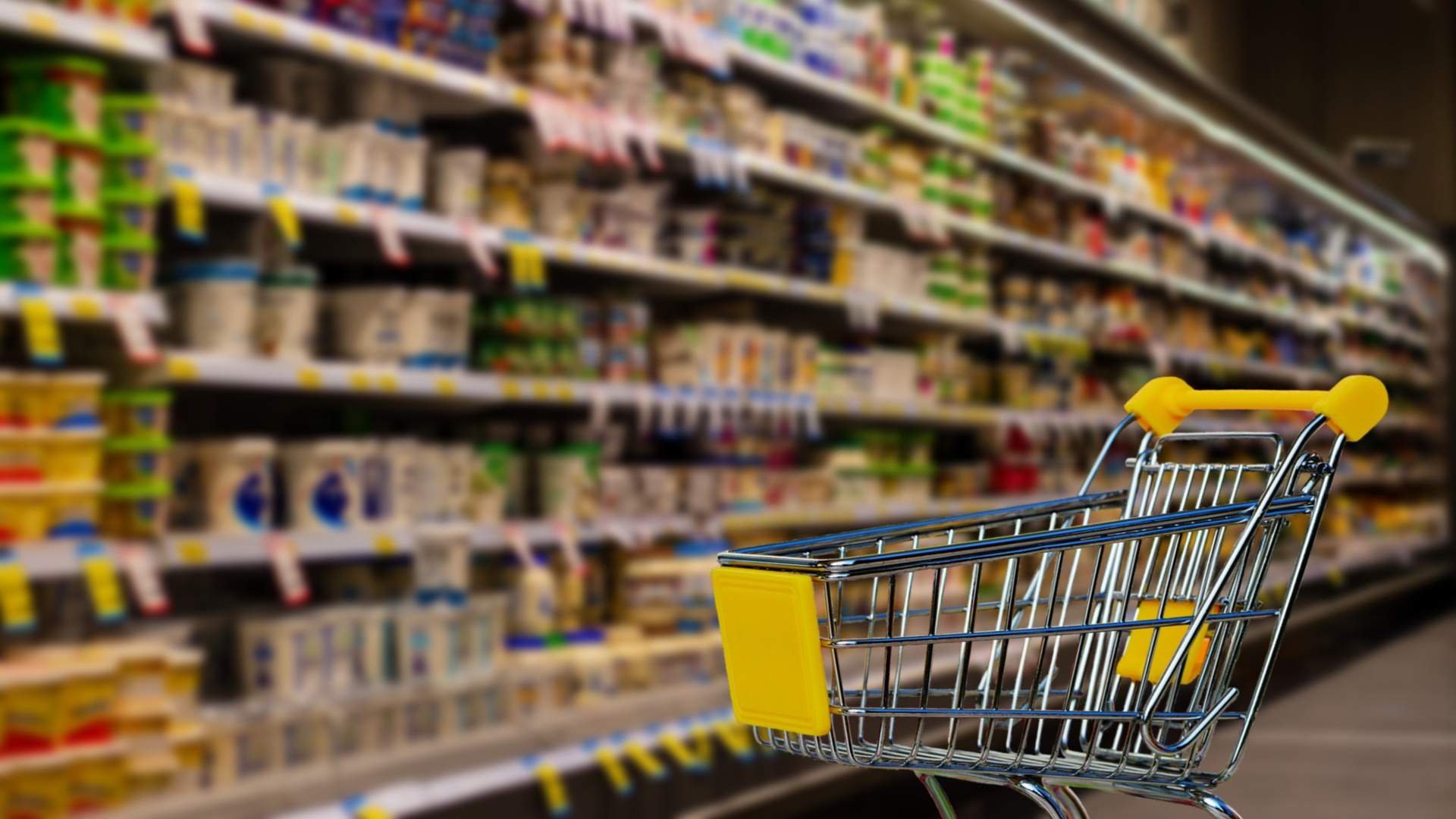 empty supermarket trolley (higher food prices in US)