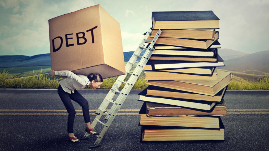 Student carrying a banner that says "debts" on her back as she tries to climb a ladder leaning on books