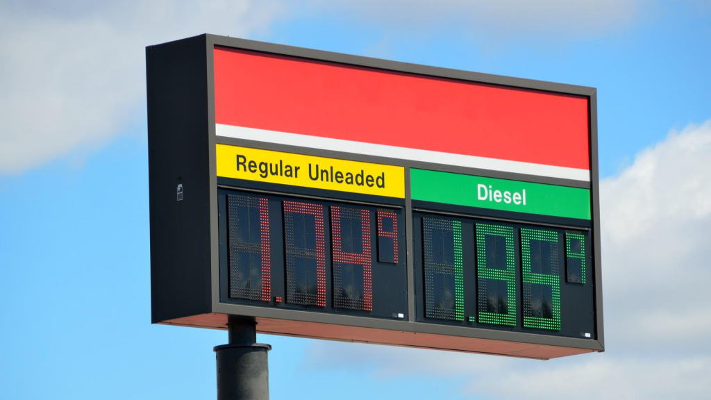 Electronic gas station price dashboard showing low prices