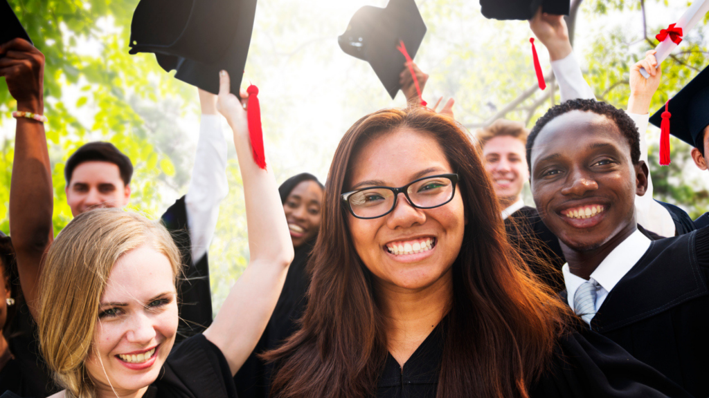 Group of students celebrating graduation (international student)