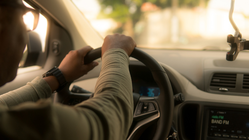 app driver inside car (Uber rates in New York)