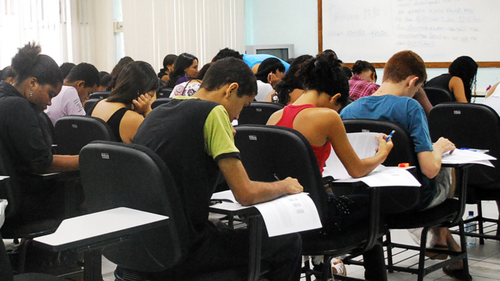 Students solving an exam in the classroom