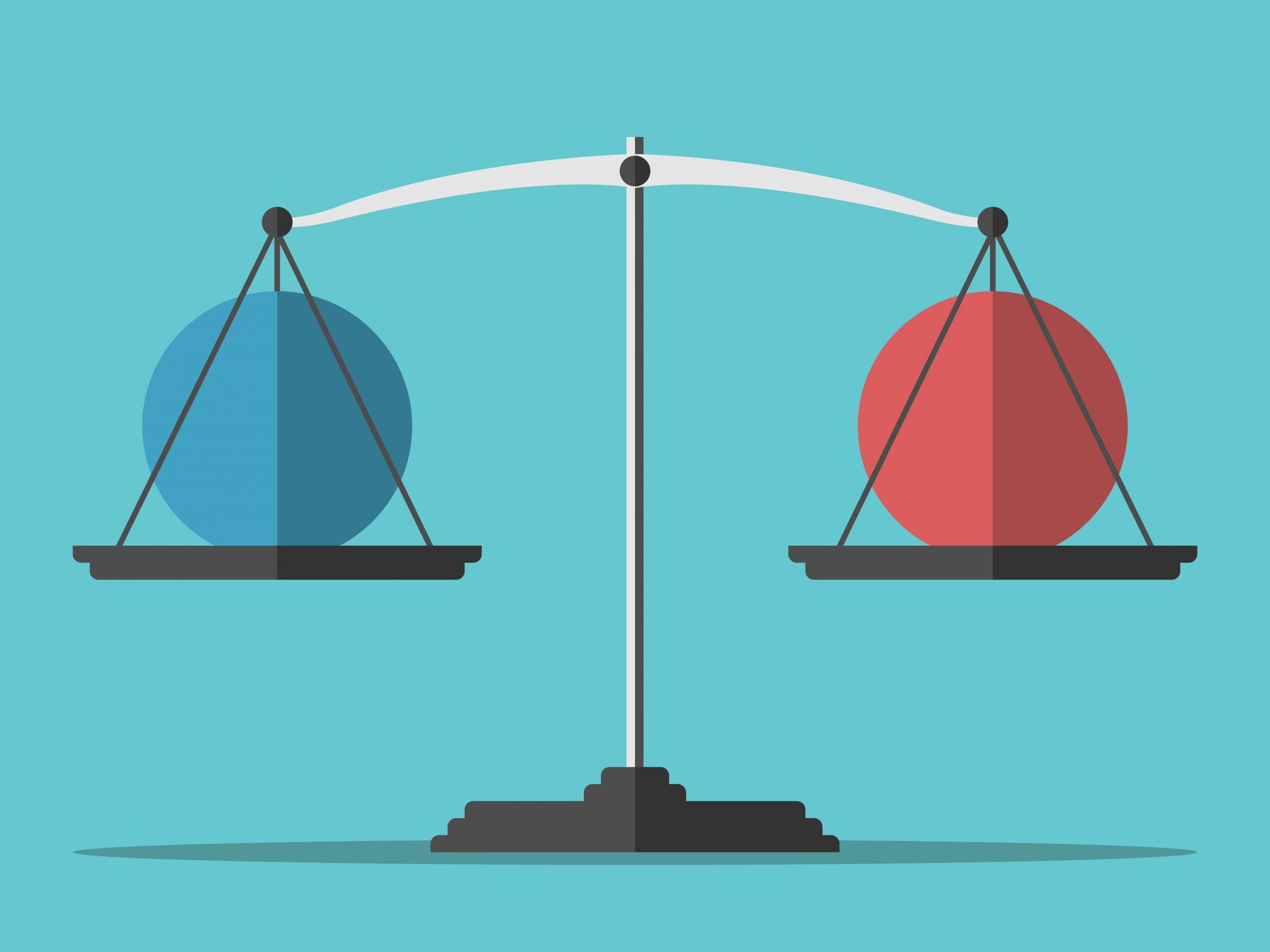 Balance weighing two spheres