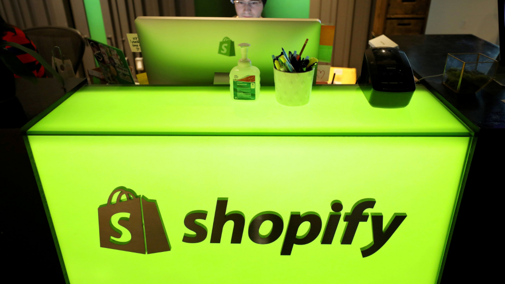 Luminous worktable with Shopify logo