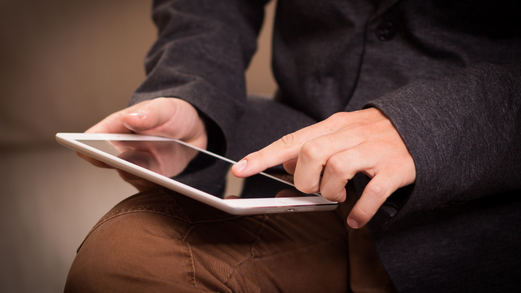 person using tablet