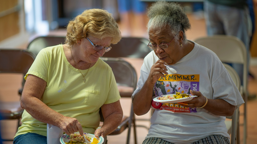 elderly people eating (Commodity Supplemental Food Program)