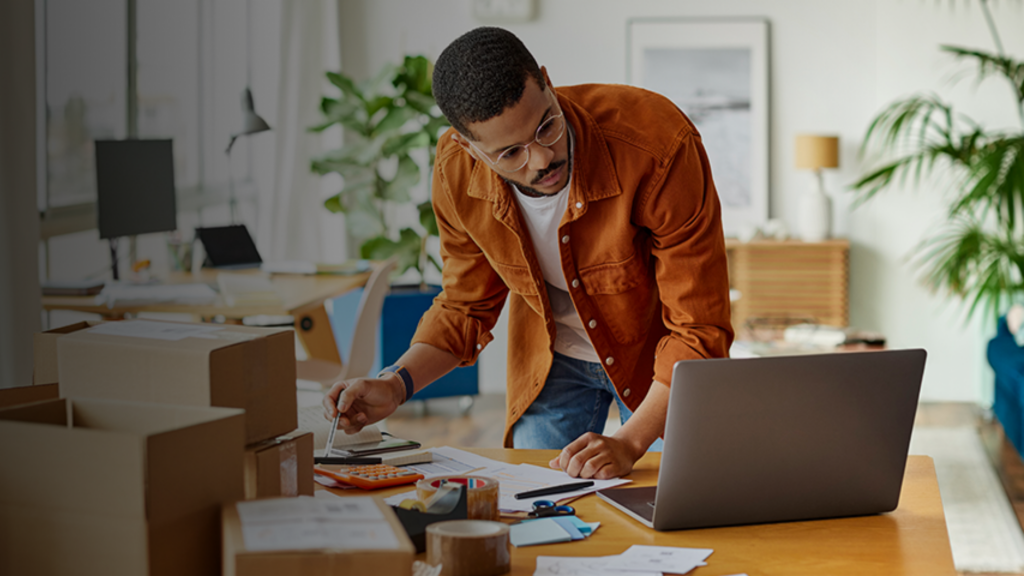 Men using a notebook/laptop (apply Absa Flexi Core Credit Card)