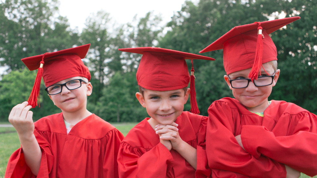 Children in preschool graduation