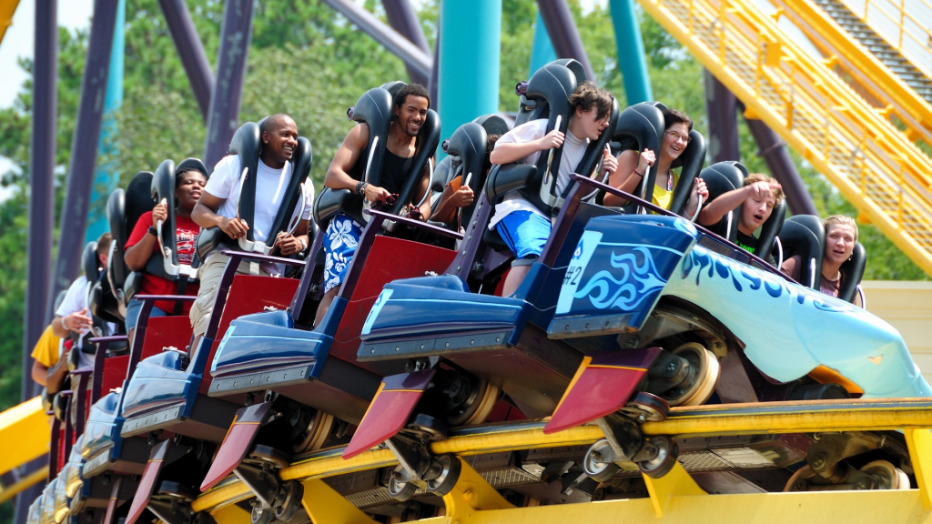 People on roller coaster having fun