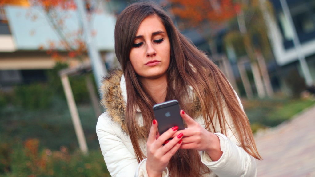 woman using smartphone