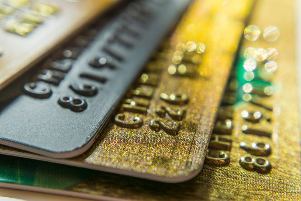 Gold and platinum credit cards close up