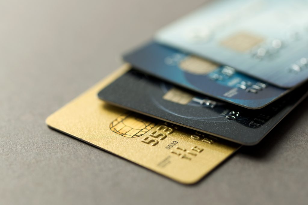 Close up of credit cards over grey background