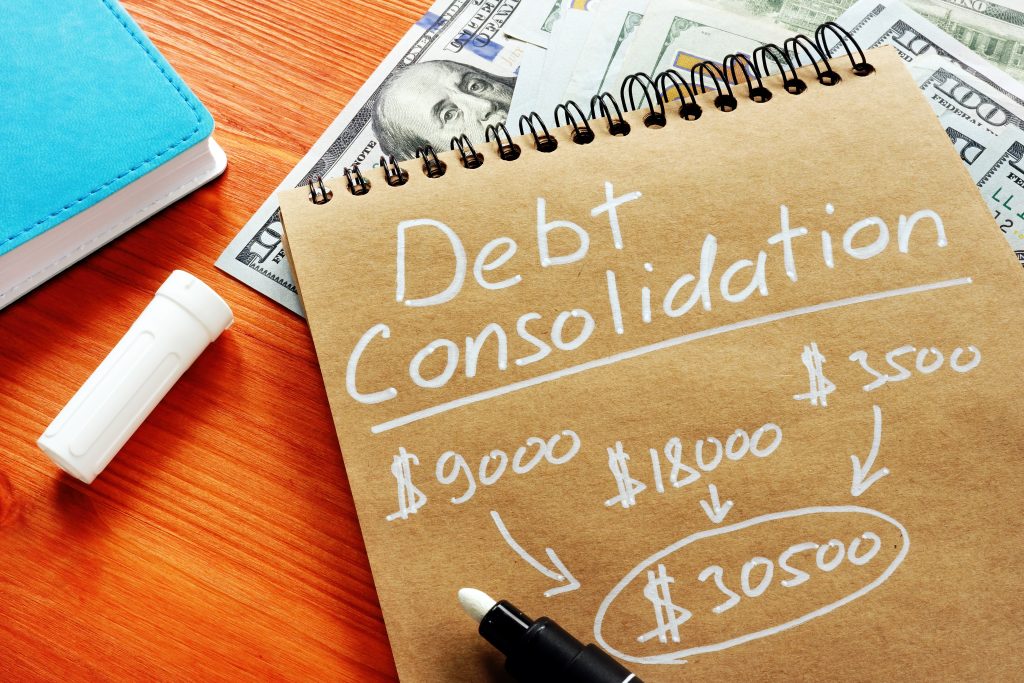 Debt consolidation title with written calculations.